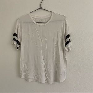 white t-shirt with grey striped on the sleeves